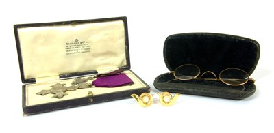 Lot 70 - A pair of simulated pearl Trifari clip on earrings