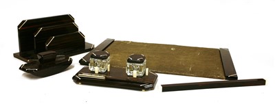 Lot 190 - An Art Deco Macassar and ivory-mounted desk set