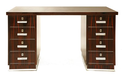 Lot 250 - An Art Deco Macassar desk