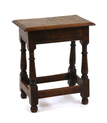 Lot 306 - An 18th century oak stool