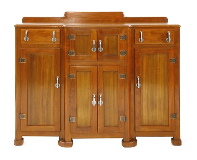 Lot 305 - An Art Deco walnut breakfront sideboard
