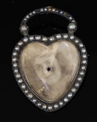 Lot 43 - A Victorian gold and silver, split pearl, padlock form brooch pendant