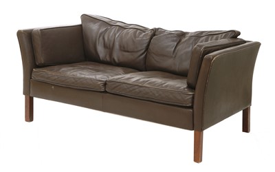 Lot 454 - A Danish chocolate leather two-seater settee