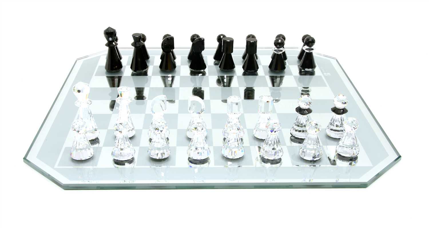 Lot 139 - A Swarovski crystal chess set