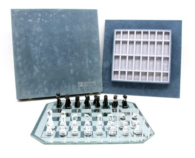 Lot 139 - A Swarovski crystal chess set