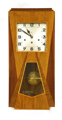 Lot 254 - An Art Deco inlaid walnut wall clock