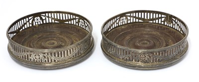 Lot 43 - A pair of George III wine coasters