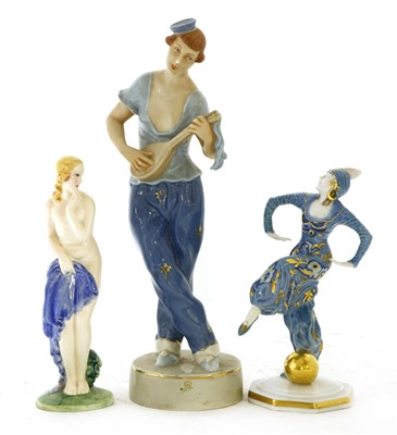 Lot 240 - A Czechoslovakian figure of a lady playing a flute