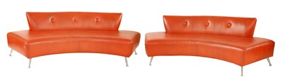 Lot 399 - A pair of pink concave lounge settees