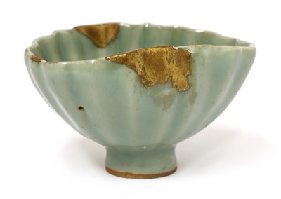 Lot 7 - A Chinese celadon tea bowl