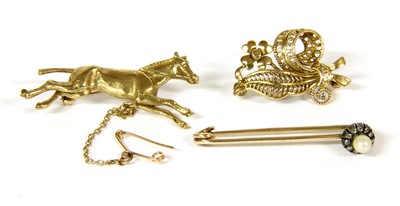Lot 90 - A pearl and diamond bar brooch