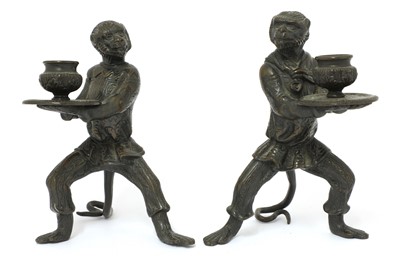 Lot 192 - A pair of Italian bronze candlesticks
