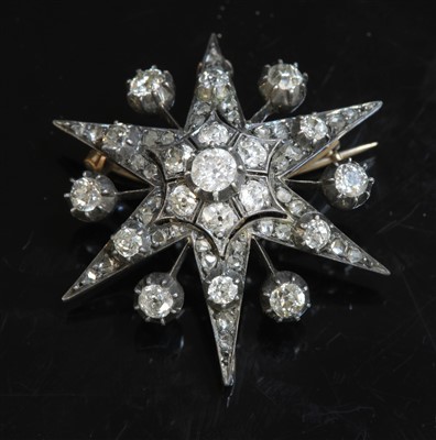 Lot 66 - A Victorian diamond set star brooch