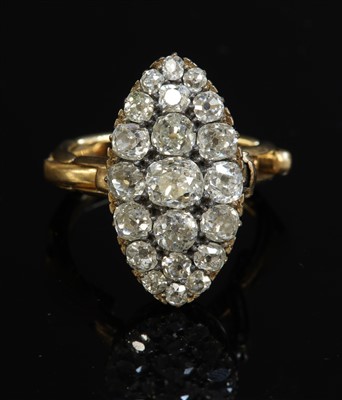 Lot 74 - A late Victorian diamond set marquise shaped cluster ring, c.1900