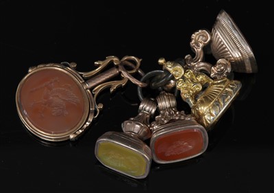 Lot 13 - A Georgian gold hardstone swivel seal