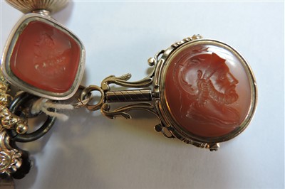 Lot 13 - A Georgian gold hardstone swivel seal