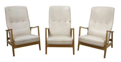 Lot 628 - Three ash lounge chairs