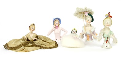 Lot 151A - Five china pin cushion or powder puff dolls