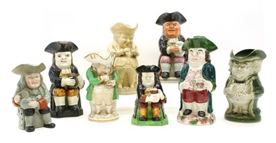 Lot 346 - A collection of Staffordshire Toby jugs