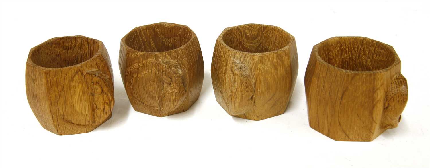 Lot 83 - A set of four Robert 'Mouseman' Thompson oak napkin rings
