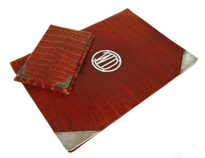 Lot 180 - An Asprey red crocodile skin desk set