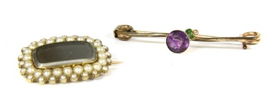 Lot 116 - A Georgian gold and split pearl memorial brooch