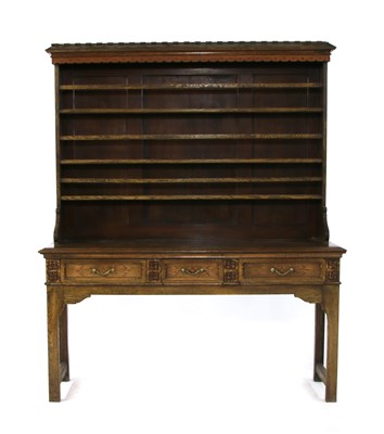 Lot 586 - An early 20th century oak dresser