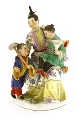 Lot 121 - A Meissen porcelain malabar figure group
