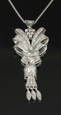 Lot 252 - A diamond set spray pendant