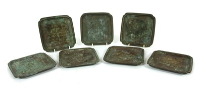 Lot 361A - A set of seven Chinese bronze calligraphic dishes