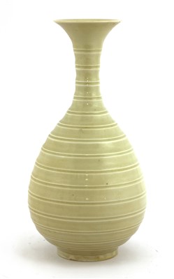 Lot 477 - A Chinese Ding ware vase