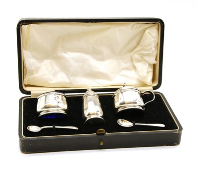 Lot 192 - A cased silver cruet set