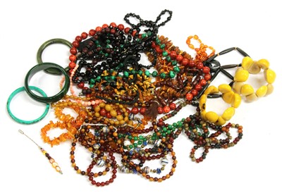 Lot 144 - A single row graduated oval shaped amber bead necklace