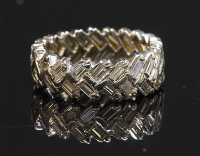 Lot 430 - A white gold diamond set band ring