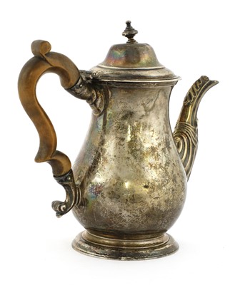 Lot 33 - A George II silver hot water pot
