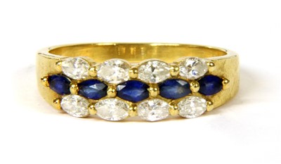 Lot 18 - An 18ct gold sapphire and diamond ring