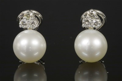 Lot 386 - A pair of Italian white gold cultured South Sea pearl and diamond drop earrings