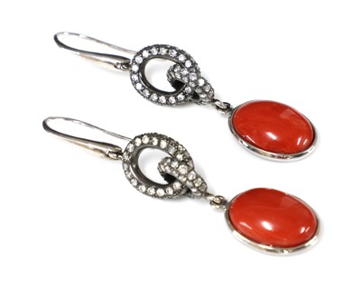 Lot 108 - A pair of Continental white gold coral and diamond drop earrings