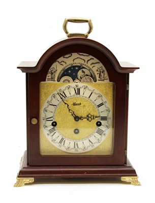 Lot 332 - A German moonphase chiming mahogany cased mantle clock