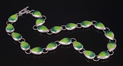 Lot 277 - A sterling silver and enamel double-sided pear drop necklace