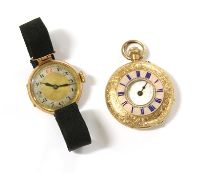 Lot 28 - A gold half hunter pin set top wind fob watch