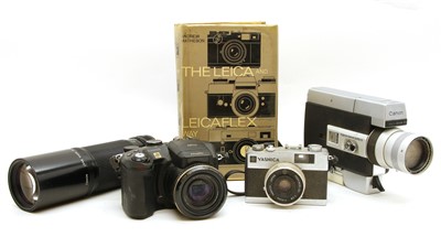 Lot 259 - A large collection of cameras and lenses