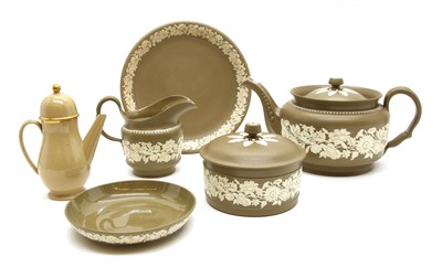 Lot 257 - A 19th century Wilson drab ware part dinner service