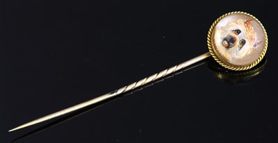 Lot 127 - A Victorian gold reverse painted intaglio stick pin