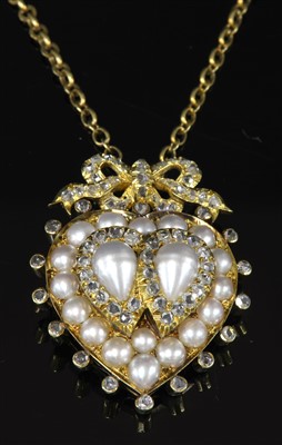 Lot 80 - A Victorian gold, split pearl and diamond entwined hearts pendant, c.1870