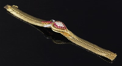 Lot 229 - An 18ct gold ruby and diamond set Jaeger-LeCoultre mechanical back wind cocktail watch, c.1950