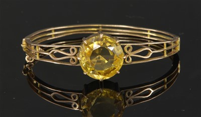 Lot 37 - A late Victorian single stone citrine bangle