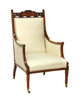 Lot 596 - An Edwardian inlaid mahogany armchair