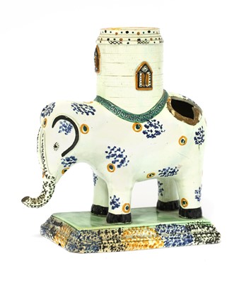 Lot 271 - A rare Yorkshire Pratt ware elephant and castle money box