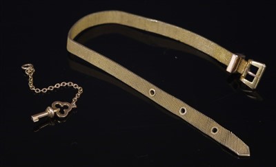 Lot 103 - A gold mesh link jarretière bracelet